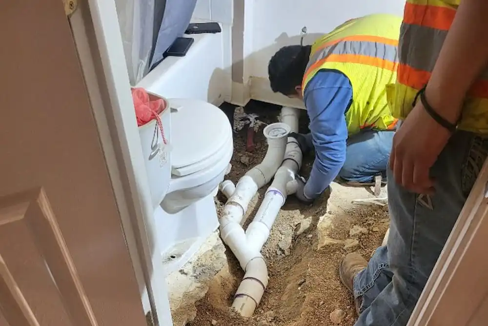 Plumber Niwot, CO Expert plumbers repairing sewer inside home or an Interior Sewer